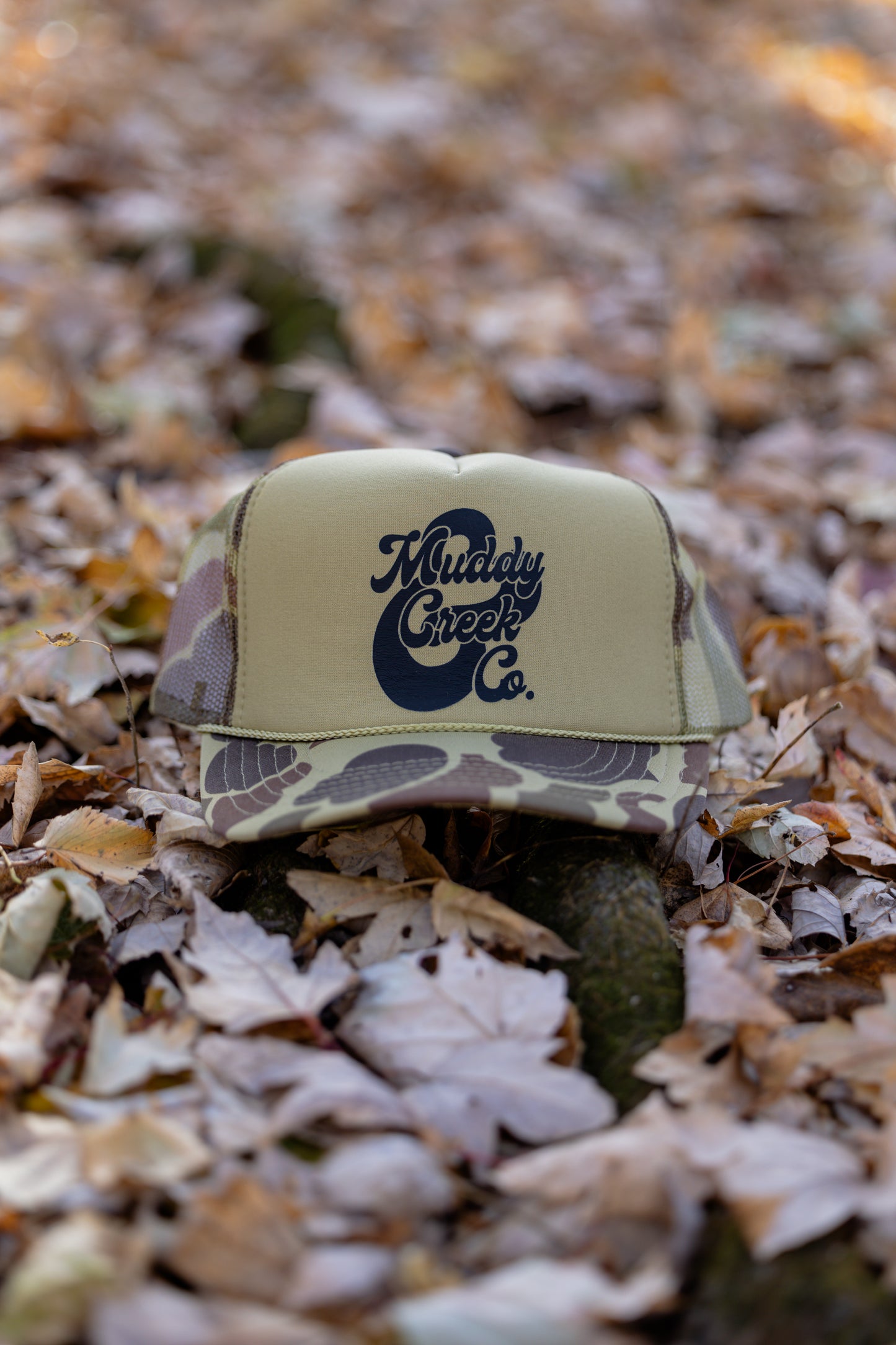 Muddy Creek & Co. Logo Trucker Hat